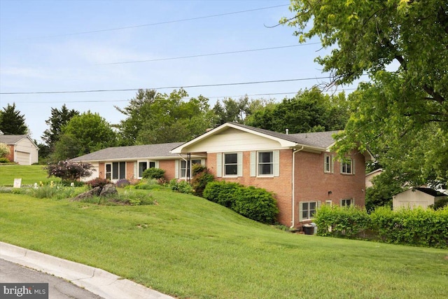 331 Ridge Ave, Winchester, VA 22601 - ranch-style house with brick siding and a front yard