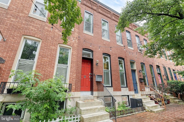21 N Collington Ave N, Baltimore, MD 21231 - view of front of home with brick siding