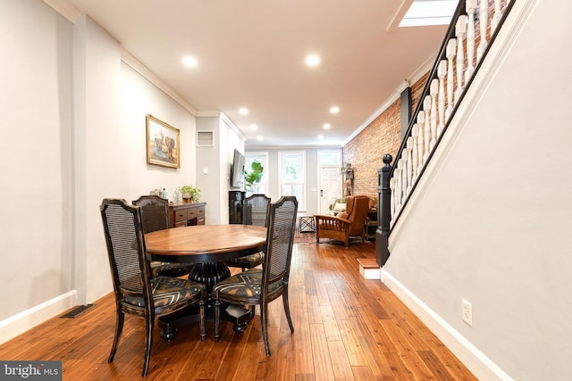 21 N Collington Ave N, Baltimore, MD 21231 - dining area with stairs, crown molding, baseboards, light wood-style floors, and recessed lighting