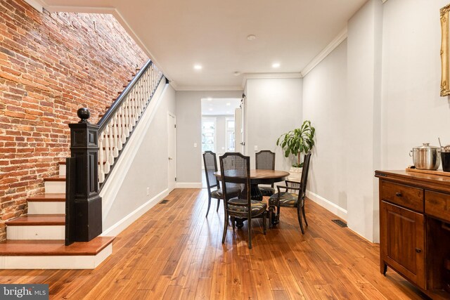 21 N Collington Ave N, Baltimore, MD 21231 - dining area featuring stairs, ornamental molding, baseboards, light wood finished floors, and recessed lighting