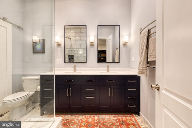 21 N Collington Ave N, Baltimore, MD 21231 - bathroom featuring double vanity, toilet, and tiled shower