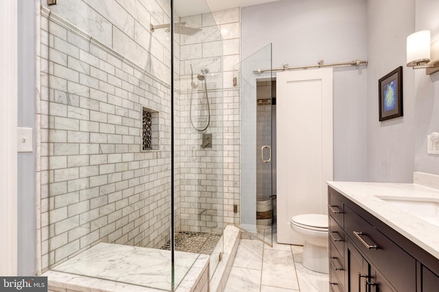21 N Collington Ave N, Baltimore, MD 21231 - bathroom featuring a stall shower, vanity, toilet, and marble finish floors