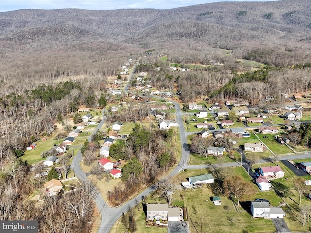 birds eye view of property featuring a mountain view and a residential view