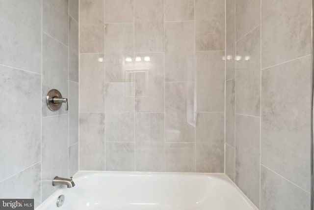 full bath featuring shower / washtub combination