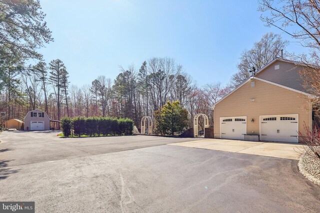 6 Meirs Rd, Cream Ridge, NJ 08514 - view of home's exterior featuring a garage and driveway