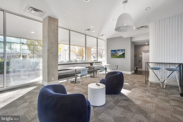building lobby featuring visible vents