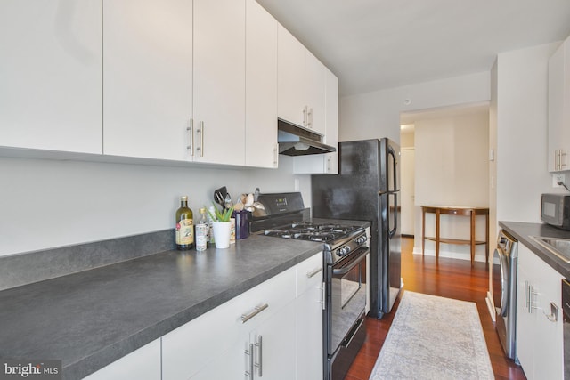 kitchen with washer / clothes dryer, white cabinetry, dark wood-type flooring, under cabinet range hood, and black appliances