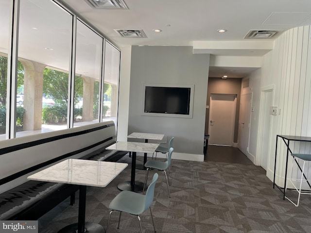 dining room featuring recessed lighting, visible vents, and dark colored carpet