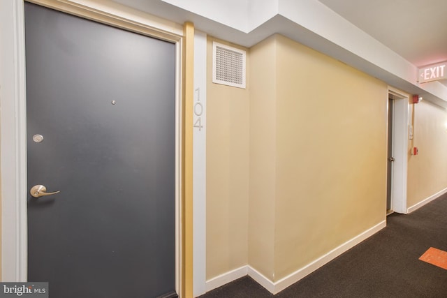 view of exterior entry with visible vents