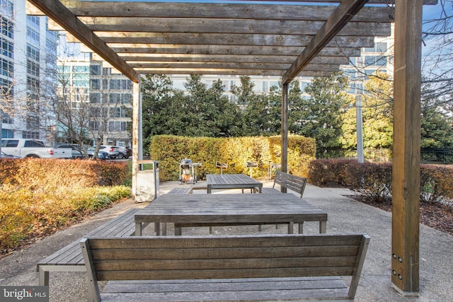view of patio / terrace featuring outdoor dining area and a pergola