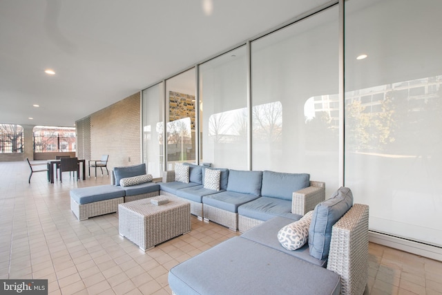 tiled living room with recessed lighting