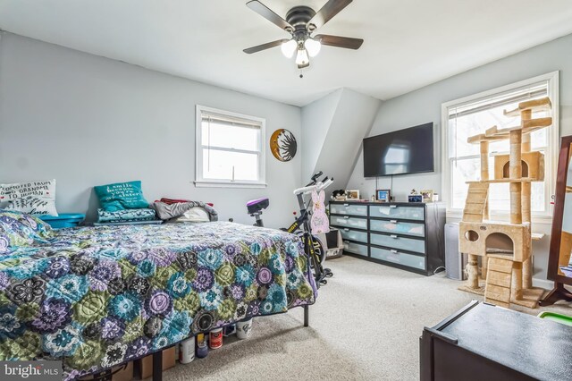 carpeted bedroom with ceiling fan