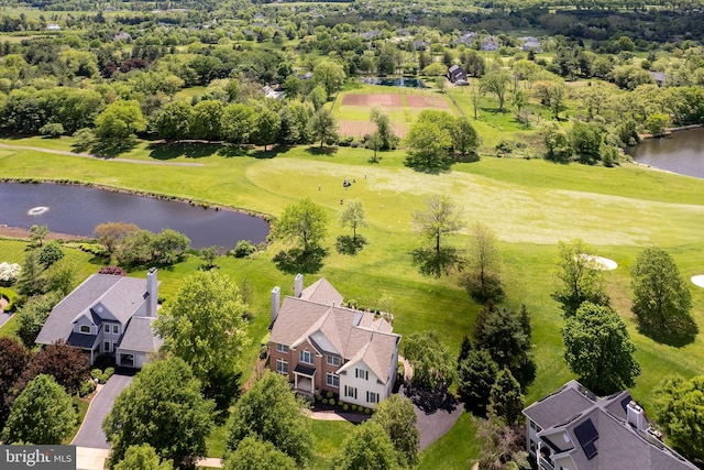 aerial view of a nearby body of water and a golf course