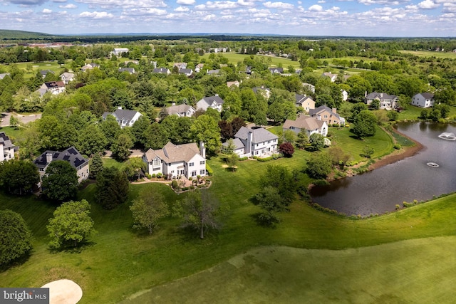 aerial perspective of suburban area featuring a large body of water