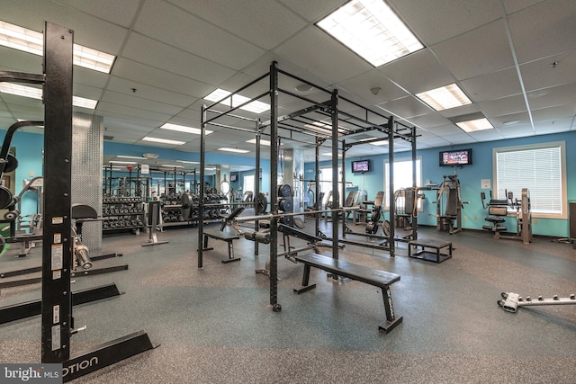 workout area with a drop ceiling