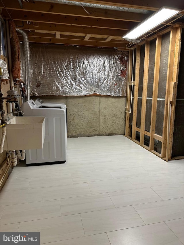 206 Fairgrove Cir, Gaithersburg, MD 20877 - unfinished basement with a sink and washer and clothes dryer