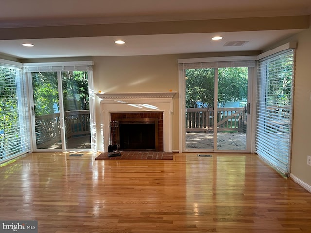 206 Fairgrove Cir, Gaithersburg, MD 20877 - unfurnished living room with wood finished floors, a fireplace, visible vents, and recessed lighting