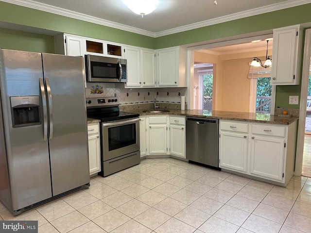 206 Fairgrove Cir, Gaithersburg, MD 20877 - kitchen with crown molding, light tile patterned flooring, a sink, stainless steel appliances, and decorative backsplash