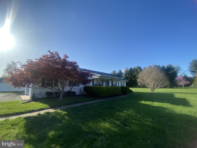 view of yard with a garage