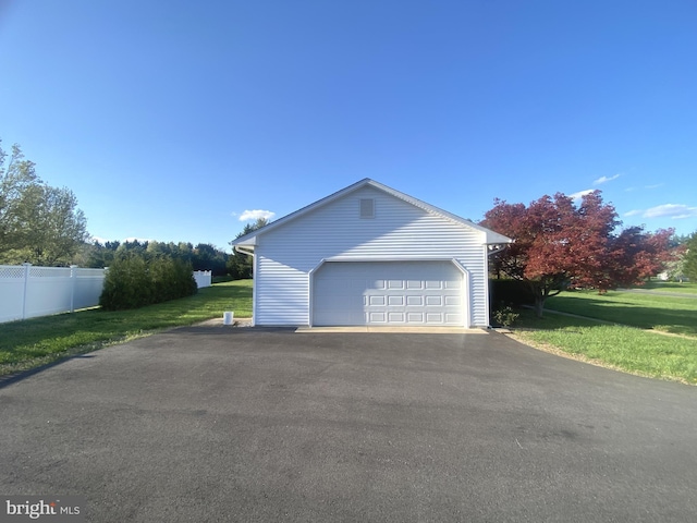 detached garage with fence