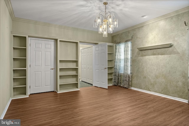 4 Tara Ln, Delran, NJ 08075 - unfurnished bedroom featuring wood finished floors, crown molding, a chandelier, baseboards, and a closet