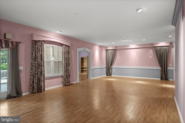 4 Tara Ln, Delran, NJ 08075 - unfurnished living room with arched walkways, wood finished floors, baseboards, crown molding, and recessed lighting