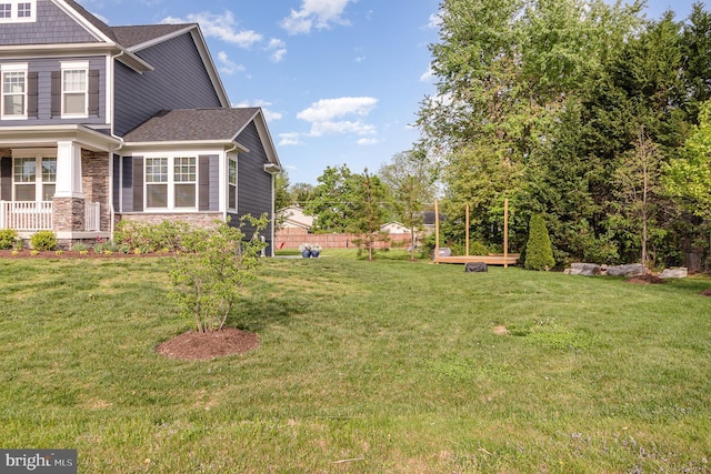view of yard with a porch