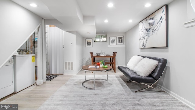 sitting room featuring recessed lighting, baseboards, visible vents, and wood finished floors