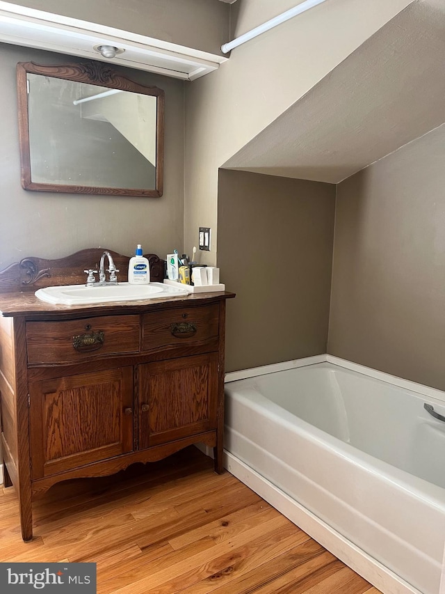 1500 Yardley Newtown Rd, Yardley, PA 19067 - bathroom with a bath, wood finished floors, and vanity