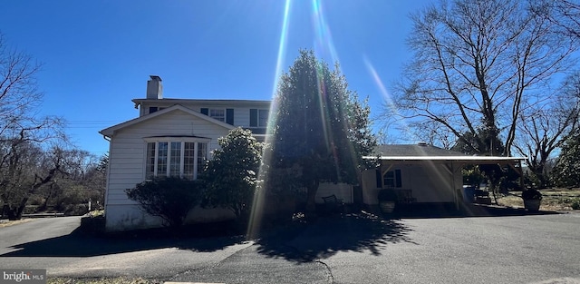 1500 Yardley Newtown Rd, Yardley, PA 19067 - view of property exterior with driveway and a chimney