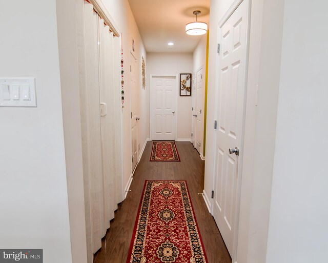 15 N Tompkins Sq, Downingtown, PA 19335 - hall featuring dark wood finished floors and baseboards