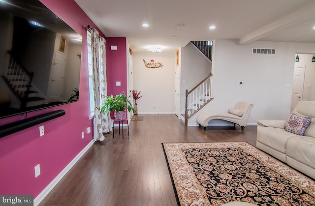 15 N Tompkins Sq, Downingtown, PA 19335 - living room with visible vents, stairs, baseboards, and wood finished floors