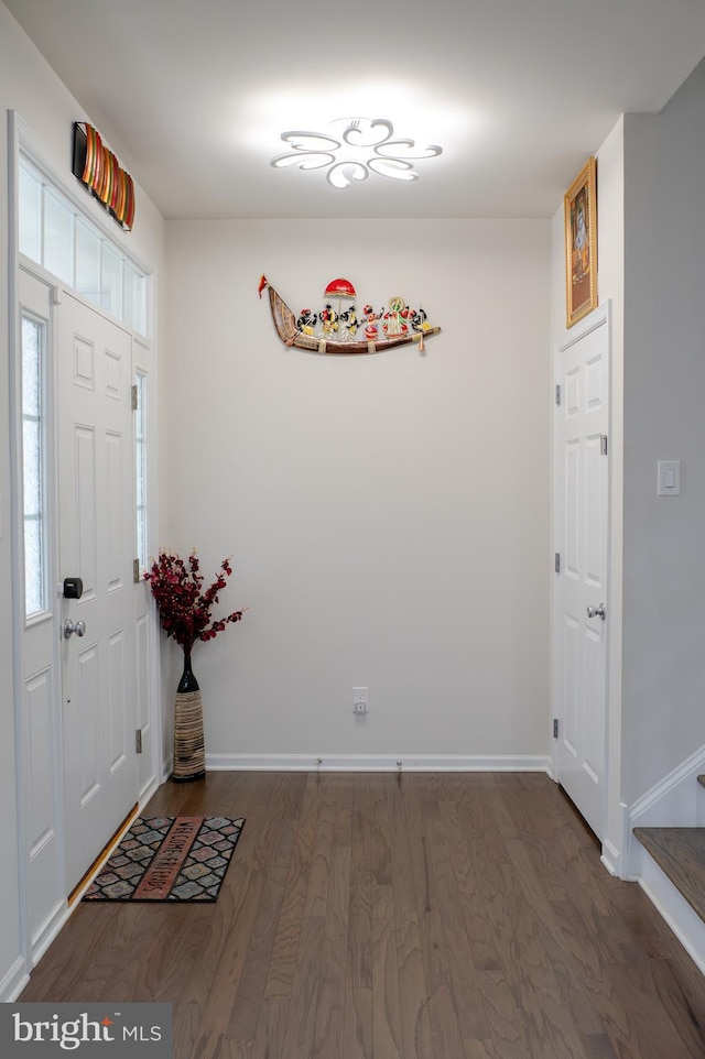 15 N Tompkins Sq, Downingtown, PA 19335 - foyer with baseboards and dark wood-style flooring