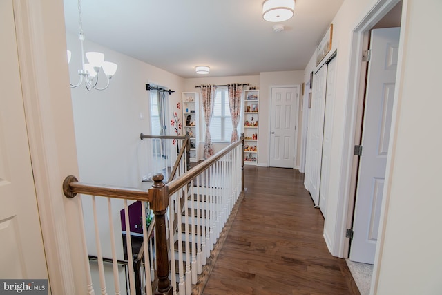 15 N Tompkins Sq, Downingtown, PA 19335 - hall with baseboards, a notable chandelier, and wood finished floors