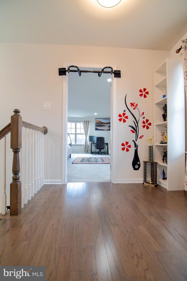 15 N Tompkins Sq, Downingtown, PA 19335 - corridor with built in features, wood finished floors, and baseboards