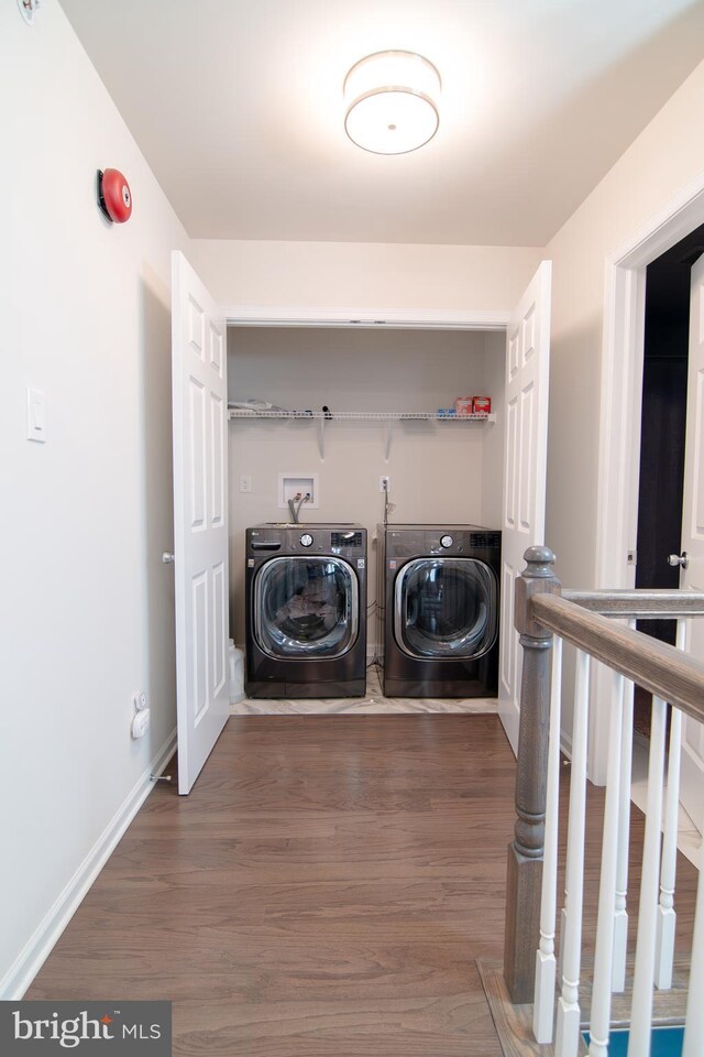 15 N Tompkins Sq, Downingtown, PA 19335 - washroom with washer and dryer, baseboards, wood finished floors, and laundry area