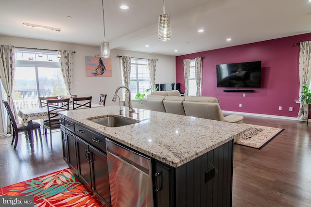 15 N Tompkins Sq, Downingtown, PA 19335 - kitchen with a sink, open floor plan, dishwasher, and dark wood finished floors
