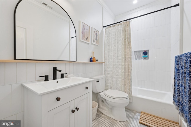 full bath with toilet, tile walls, vanity, tile patterned flooring, and shower / bath combo with shower curtain