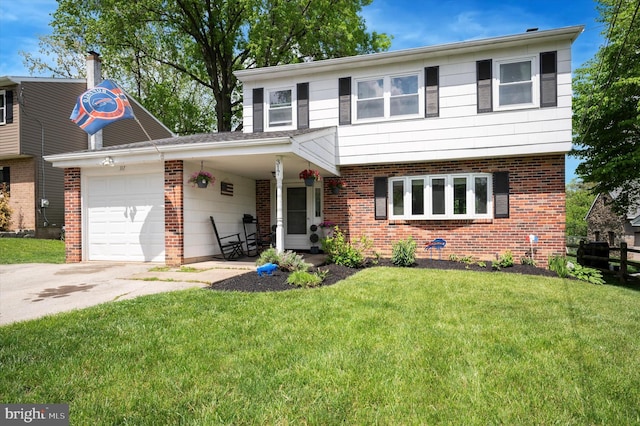 317 Montier Rd, Glenside, PA 19038 - traditional-style house with a front yard, brick siding, and an attached garage