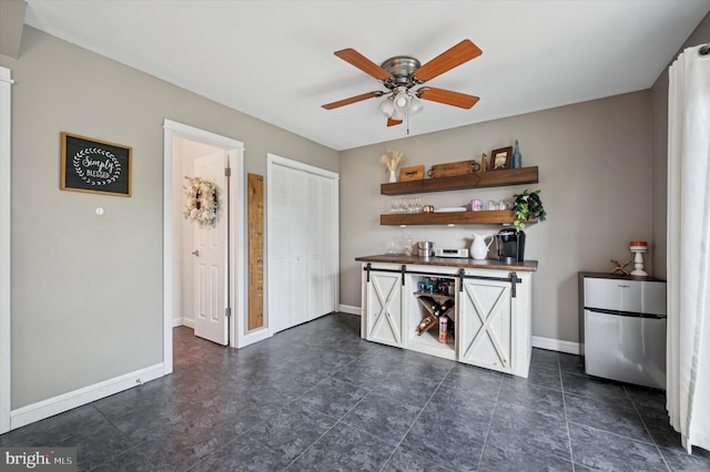 317 Montier Rd, Glenside, PA 19038 - bar with baseboards, ceiling fan, and freestanding refrigerator
