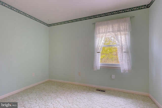 3360 Ben Oak Dr, Huntingtown, MD 20639 - spare room with baseboards, carpet floors, and visible vents