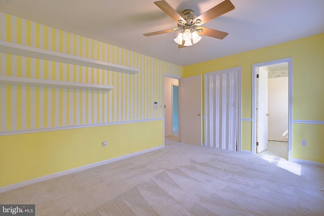 3360 Ben Oak Dr, Huntingtown, MD 20639 - unfurnished bedroom featuring baseboards, carpet floors, and wallpapered walls