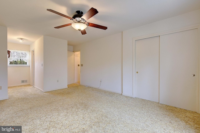 3360 Ben Oak Dr, Huntingtown, MD 20639 - unfurnished bedroom with a closet, carpet flooring, visible vents, and a ceiling fan
