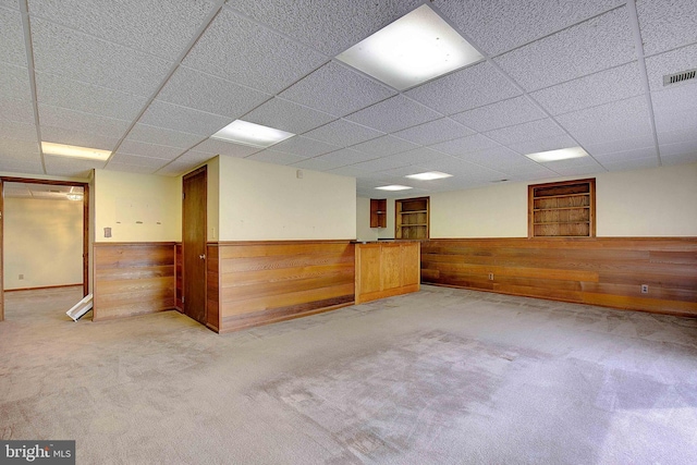 3360 Ben Oak Dr, Huntingtown, MD 20639 - carpeted spare room with visible vents, wooden walls, and wainscoting