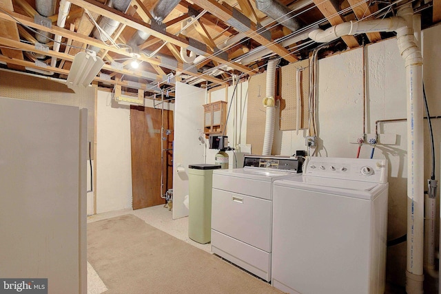 3360 Ben Oak Dr, Huntingtown, MD 20639 - clothes washing area featuring washing machine and dryer and laundry area