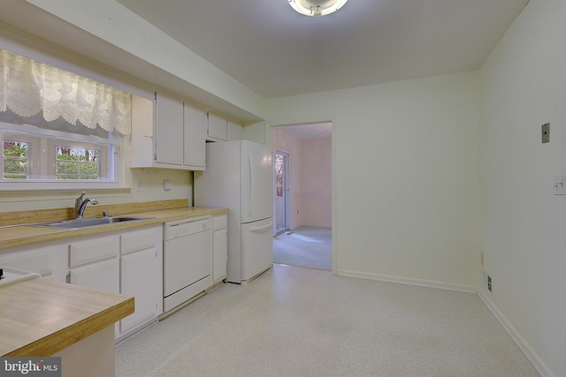 3360 Ben Oak Dr, Huntingtown, MD 20639 - kitchen with baseboards, light countertops, a sink, and white appliances