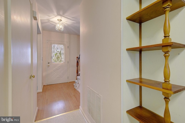 3360 Ben Oak Dr, Huntingtown, MD 20639 - doorway to outside featuring baseboards, visible vents, and wood finished floors