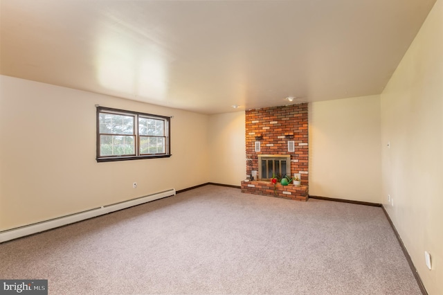 unfurnished living room featuring a baseboard heating unit, baseboards, carpet flooring, and a fireplace