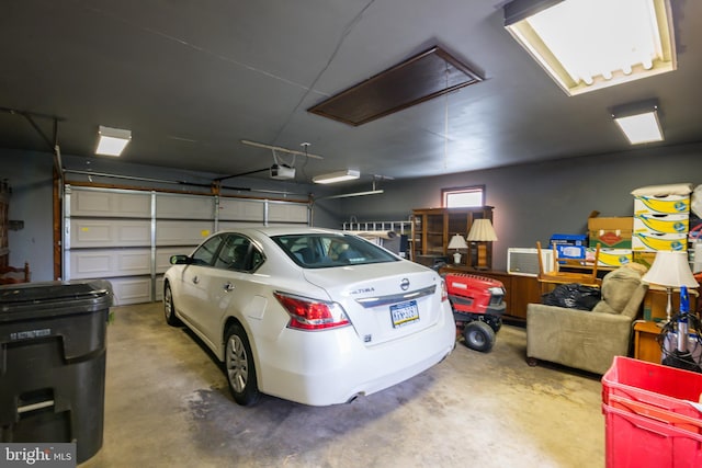 garage featuring a garage door opener