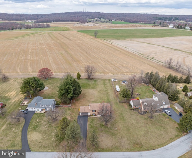 birds eye view of property featuring a rural view